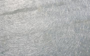 Far Arnside laminate fibreglass or shingles?